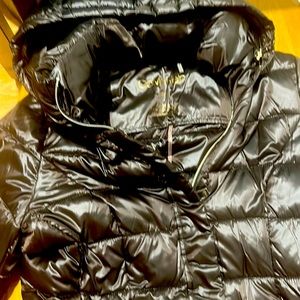 Never worn Calvin Klein dark brow hoodie coat . Long style above the knee